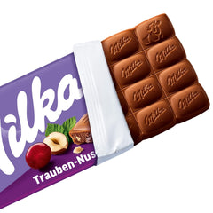 Milka szőlő és mogyoró – alpesi tejcsokoládé mogyoró- és mazsoladarabokkal – 90g