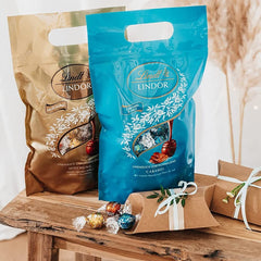 LINDOR csokoládégolyók sós karamellel | kb. 80 db tejcsokoládé golyó sós karamell töltelékkel | Bulk Pack & Marc de Champagne csokoládégolyók | 700 g