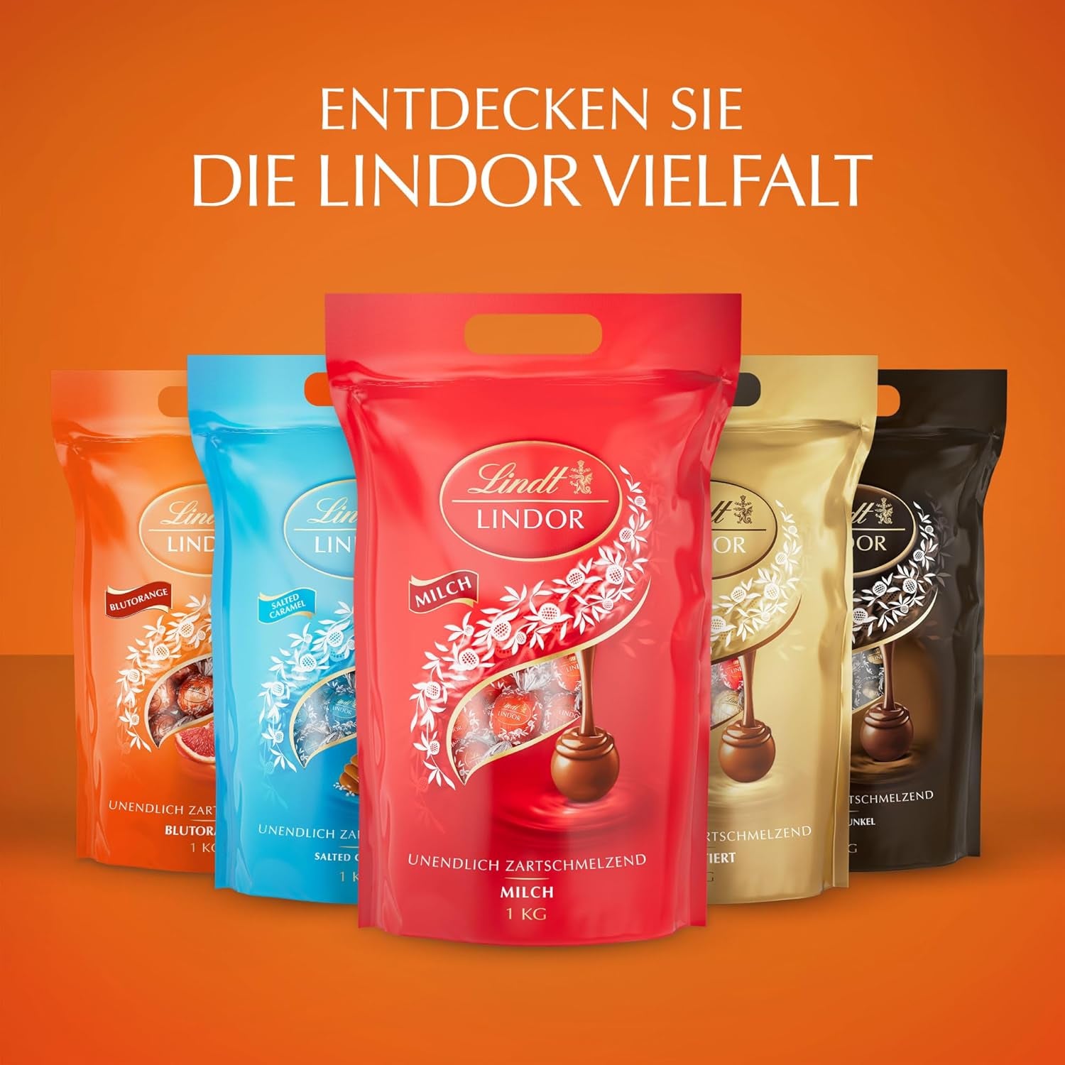 Lindt LINDOR Vörös narancssárga csokoládégolyók | 1 kg-os visszazárható zacskó | kb. 80 db csokoládé cukorka szájban olvadó töltelékkel | Tömeges csomag, csokoládé ajándék