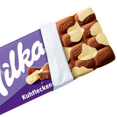 Milka Cow Spots – alpesi tejcsokoládé fehér csokoládéval tehénfoltos kivitelben – 24 x 90g