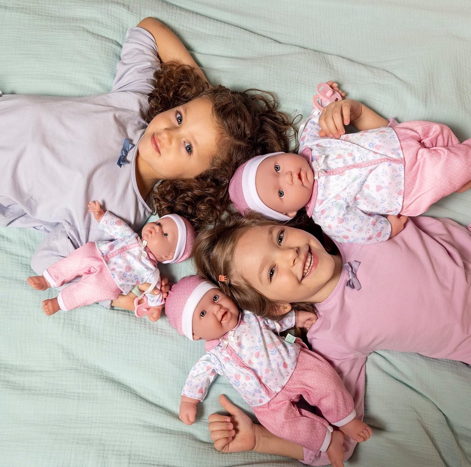 JC Toys La Baby Puppe mit weichem Körper, waschbar, magische Flasche und Schnuller, rosa und weiß, Blumenmuster, entworfen in Spanien, 2 Jahre