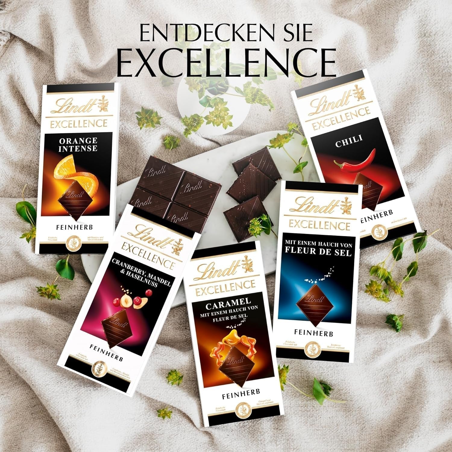 Lindt EXCELLENCE Orange Intense, 100 g, ciocolată neagră cu bucăți de portocale și migdale Bomboane de Ciocolata Naty Shop