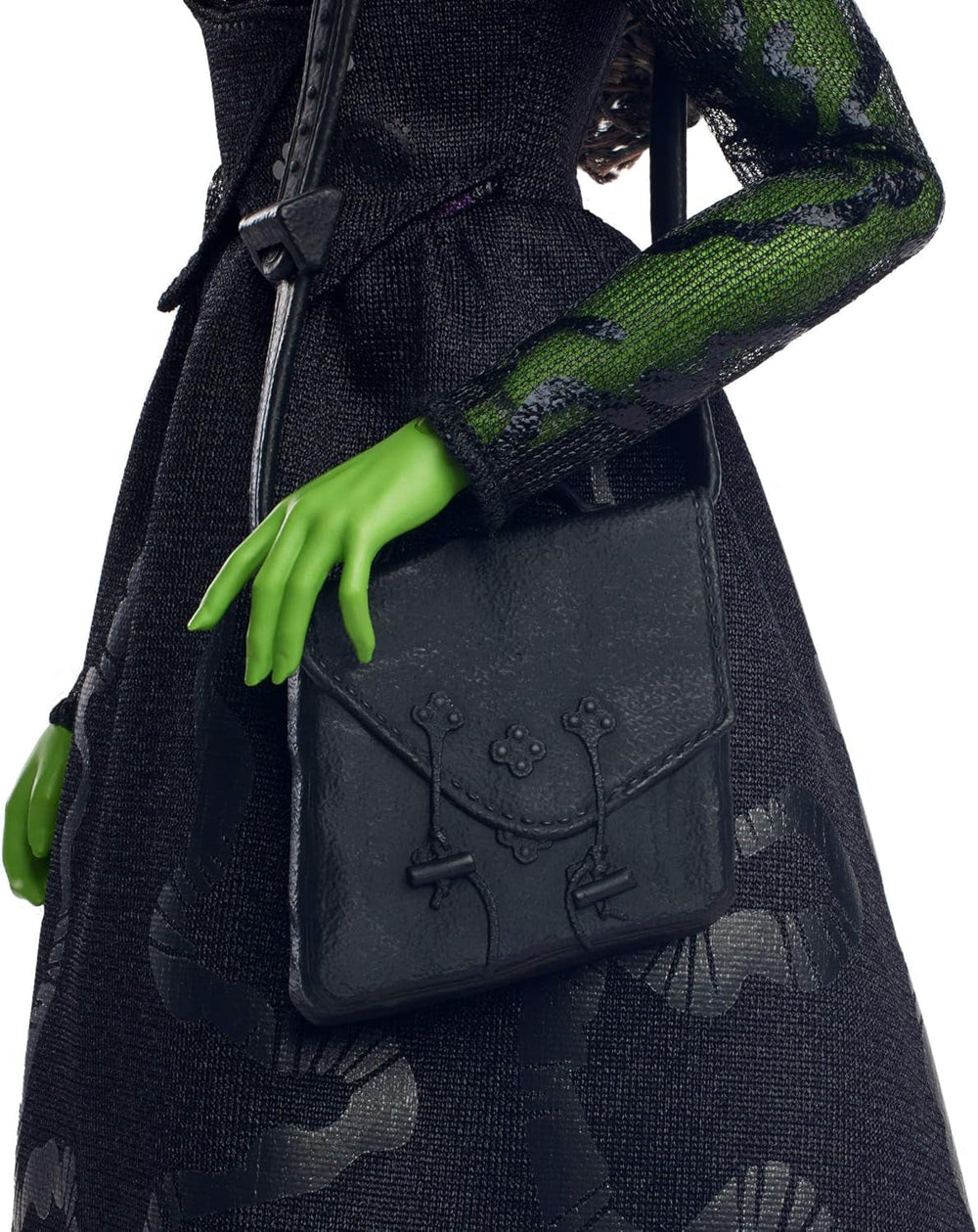 Mattel Wicked Elphaba divatbaba és kiegészítők zöld bőrrel, fekete fonott hajjal, különböző lehetséges pózokkal és meghosszabbítható báli ruhával, HXT62, [többszínű] Naty Shop babák