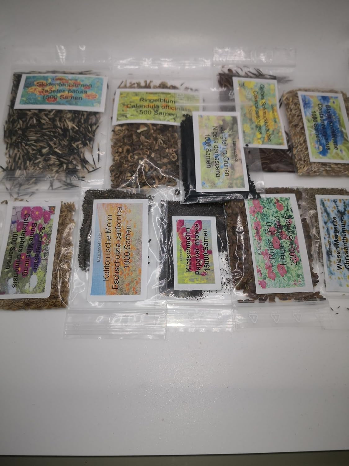 Set de semințe de flori sălbatice, 10 soiuri, 28.000 de semințe, amestec de flori sălbatice de luncă cu maci, albăstrele, gălbenele, margarete și multe altele, toate ambalate individual