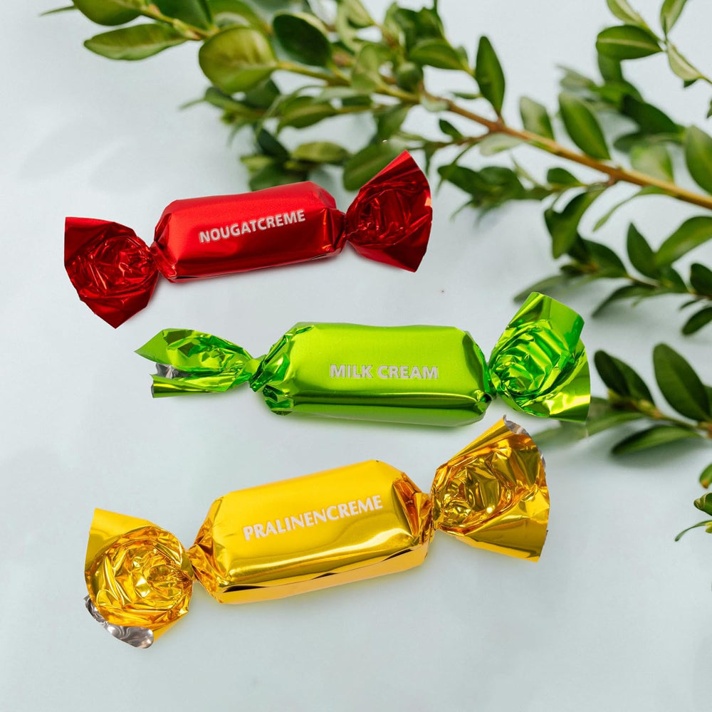 Heidel húsvéti kártya díszdoboz 183g, prémium tejcsokoládé praliné dekoratív fémdobozsal, ideális húsvéti ajándéknak