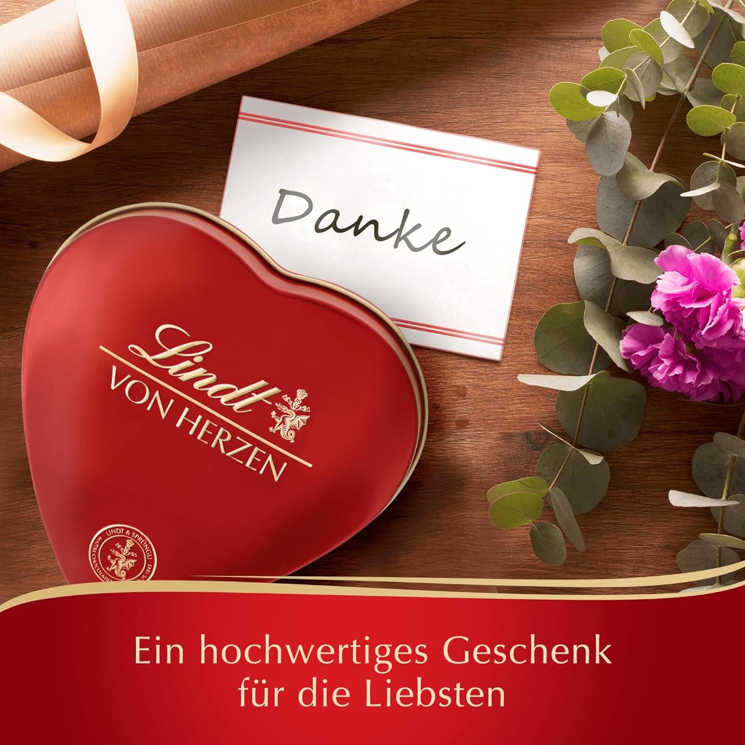 Lindt csokoládé szívből | 30 g | 6 praliné Marc de Champagne-ban, Coeur à l'Orange, Ropogós tejcsokoládé, Narancsos Marcipán, gyönyörű szív alakú dobozban | Ajándék csokoládé | Csokoládé ajándék