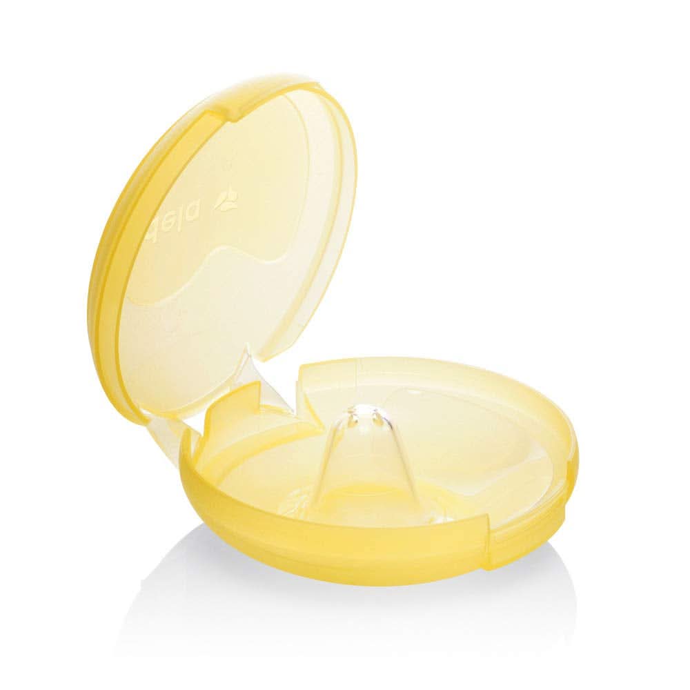 Medela Protectie pentru mamelon, silicon, multicolor Accesorii Hrana si Alaptare Bebe Naty Shop