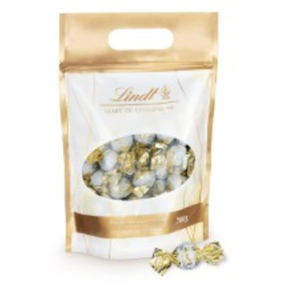 Lindt Marc De Champagne 56 teljes tejcsokoládé finomított alkoholtartalmú töltelékkel 70 gramm Naty Shop Chocolates