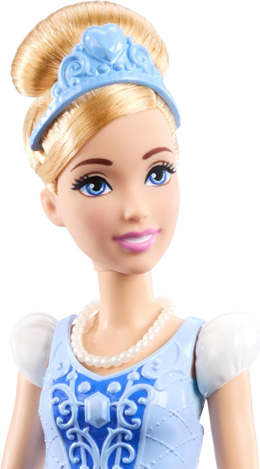 Mattel Disney-Princess-Spielzeuge, Hamupipőke-Modepuppe 2 Looks, 9 Accessoires, 2 Oberteile zum Anklipsen és 2 Röcke. 2-in-1-Geschichten inspiriert vom Disney-Film, JCR95