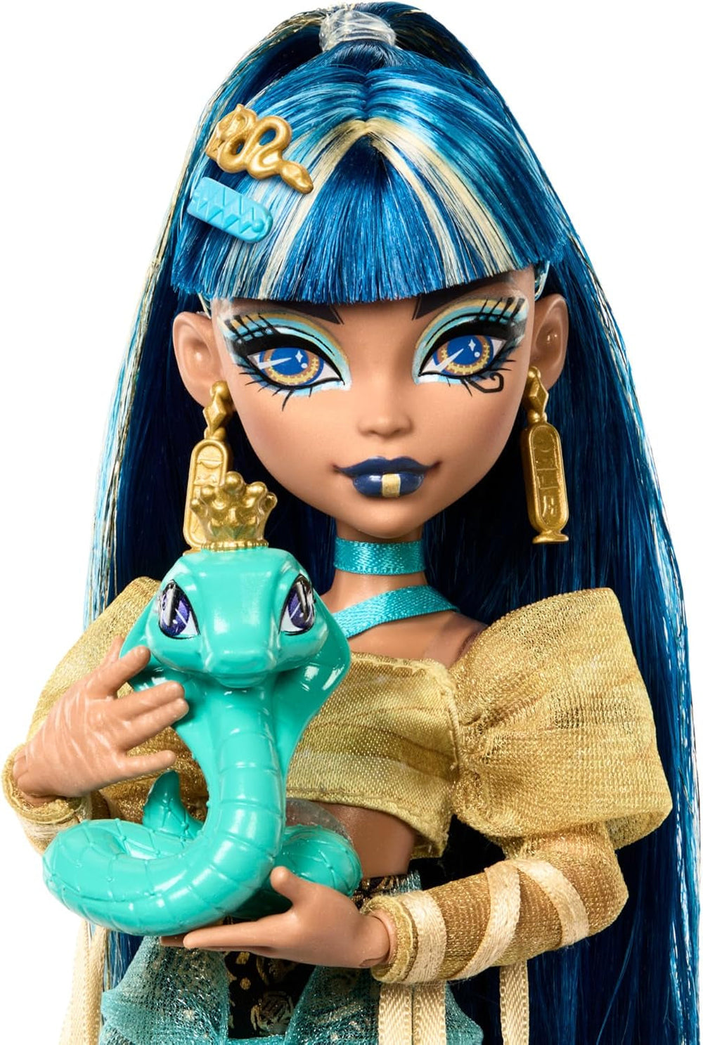 Monster High Cleo De Nile baba arany blúzban és réteges szoknyában, Cobra Hissette kisállattal és olyan kiegészítőkkel, mint a hátizsák, snack és papírtekercs, HXH74 Naty Shop babák