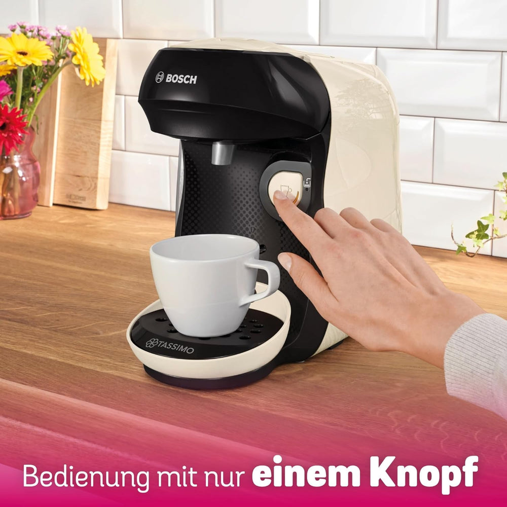 Espressor cu capsule Bosch Tassimo Happy Friendly TAS107E, peste 70 de băuturi, potrivit pentru toate tipurile de cești, oprire automată, sustenabil, dozare perfectă, economie de spațiu, 1400 W, crem/negru