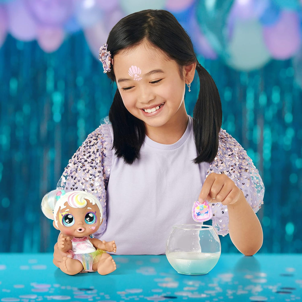 Baby Sister-Puppe Mini Mello als Einhorn, 1 Puppe mit Spielzeug Pacifier und Zauberschwamm für magische Gesichtsbemalung. Große, glitzernde Augen, biegsame Arme und Beine, 50275