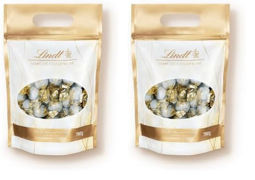 Lindt Marc de Champagne csokoládégolyók | 700 g kb. 56 db tejcsokoládé cukorka finomított töltelékkel, alkoholt tartalmaz | Tömeges csomag | Ajándék csokoládé | Csokoládé ajándék