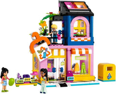 LEGO Friends Vintage divatbolt építőkészlet gyerekeknek játékbolttal, figurákkal és macskával, társadalmi-érzelmi fejlődést segítő példakép, ajándék 6 éves lányoknak és fiúknak 42614 építőkészlet Besuche den LEGO-Store