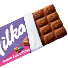 Milka csokoládé kakaós lencsével - Alpesi tejcsokoládé ropogós lencsés csokoládéval - 100g