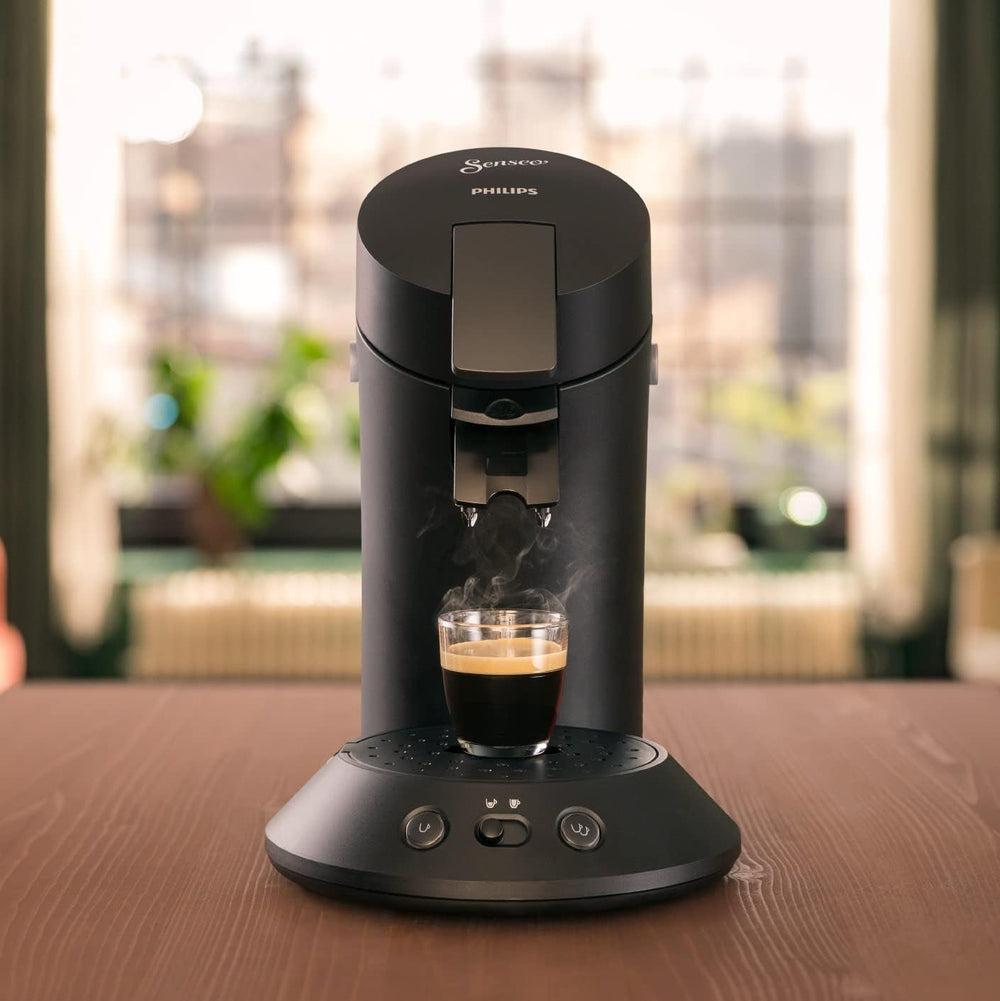 Espressor cu capsule PHILIPS Original Plus Eco, selecție a intensității cafelei, tehnologie Coffee Boost, plastic reciclat cu 80%*, consum de energie redus cu 45%**, 2 căni simultan, negru piano (CSA210/22)