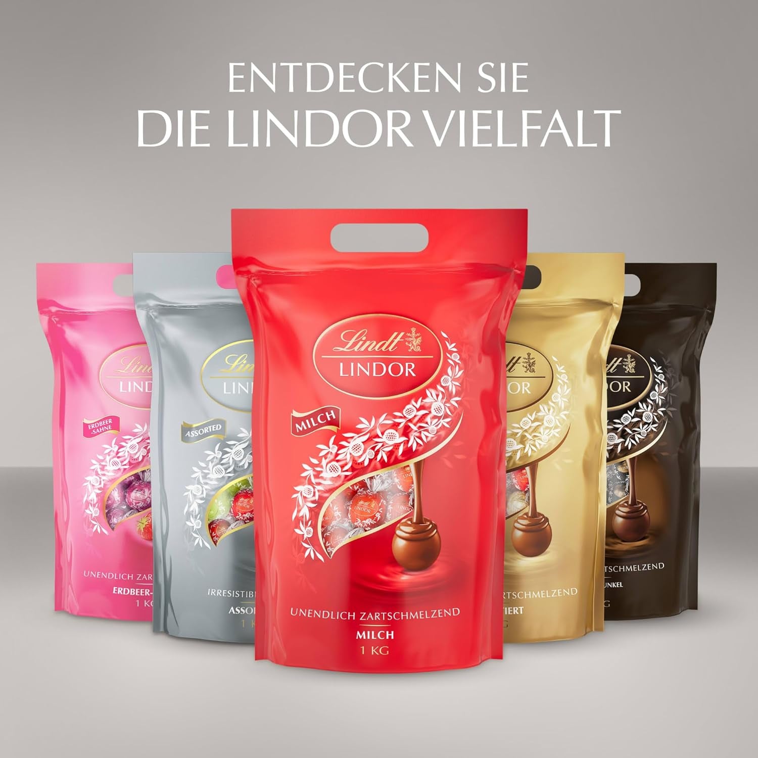 Lindt csokoládé | Válogatott táska LINDOR ezüst | 1 kg-os zsák | 80 szájban olvadó tejcsokoládé golyó, 70%, sós karamell és dupla csokoládé ízesítés | Ajándék csokoládé megosztani